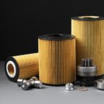 Why do compressors consume more oil, and how can an air and oil separator fix this issue?